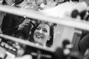 Bride in mirror at The Ashes Country House wedding venue