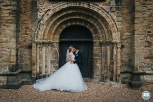 Bride and groom in church door at Eckington Church