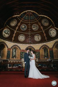 bride and groom under the ceiling at Emmanuel Church in Bestwood